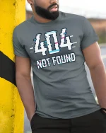 404 Not Found Glitch T-Shirt Funny Tech Tee - model in grey shirt leaning against column