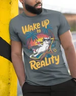 Wake Up to Reality Cat Tee Funny Beach T-Shirt - model in grey shirt leaning against column