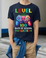 Level 100 Days of School Unlocked T-Shirt - model wearing Navy T-shirt, hands in pockets, denim shirt at waist