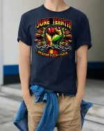 Juneteenth Breaking Every Chain Tee - model wearing Navy T-shirt, hands in pockets, denim shirt at waist