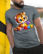 Baby Tiger Puzzle Play Tshirt - model leaning on yellow-black pole, wearing Gray T-shirt, hand in pocket