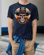 Cowboy Skull Graphic Tee - model wearing Navy T-shirt, hands in pockets, denim shirt at waist