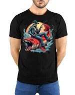 Skeleton Fisherman Riding Monster Fish Tee - model with hands behind back, wearing Black T-shirt and blue jeans