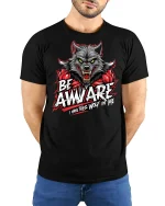 Be Awware Wolf Graphic Tee - model with hands behind back, wearing Black T-shirt and blue jeans