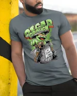 Funny Oscar Grouch Parody Tee - model leaning on yellow-black pole, wearing Gray T-shirt, hand in pocket