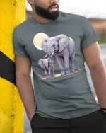 Elephant and Baby Moonlight T-shirt - model leaning on yellow-black pole, wearing Gray T-shirt, hand in pocket