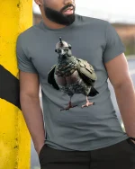Tactical Pigeon Soldier Funny T-Shirt - model leaning on yellow-black pole, wearing Gray T-shirt, hand in pocket