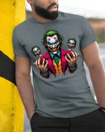 Villain Rage Clown Horror Tee - model leaning on yellow-black pole, wearing Gray T-shirt, hand in pocket