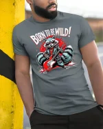 Born to Be Wild Rock Raccoon T-shirt - model leaning on yellow-black pole, wearing Gray T-shirt, hand in pocket