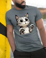 Funny Big Eyes Cat Surprised Expression Art T-Shirt - model wearing grey tee, leaning on column