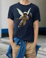 Fantasy Astronaut Fairy With Axe Cosmic Warrior Tee - model wearing navy tee with hands in pockets