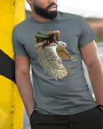 Fantasy Owl Rider Warrior Flight Epic Art Graphic Tee - model wearing grey tee, leaning on column