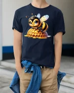 Cute Honey Bee Sitting on Honeycomb Graphic T-Shirt - model wearing navy tee with hands in pockets