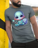 Cute Baby Alien in Pajamas T-Shirt - model leaning on yellow-black pole, wearing Gray T-shirt, hand in pocket