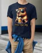 Brew-tiful Day Capybara Beer Lover Funny T-Shirt - model wearing Navy T-shirt, hands in pockets, denim shirt at waist