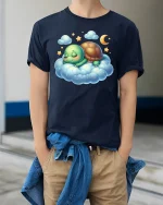 Sleeping Turtle T-Shirt Cute Dreamy Cloud Design - model wearing navy tee with hands in pockets