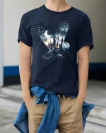 Mystic Owl Night Castle Fantasy Magic T-Shirt - model wearing navy tee with hands in pockets