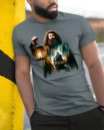 Fantasy Forest Train Keeper Lantern Magic T-Shirt - model wearing grey tee, leaning on column