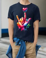 Colorful ASL I Love You Hand Sign T-Shirt Vibrant Heart Art - model wearing navy tee with hands in pockets