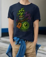 Creepy Eyeball Potion Graphic T-Shirt Spooky Fantasy Art Tee - model wearing navy tee with hands in pockets