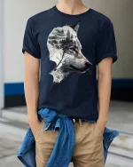 Mystic Forest Wolf Silhouette Art Tee for Nature Lovers - model wearing navy tee with hands in pockets