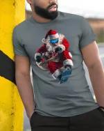 Extreme Snowboarding Santa Tee for Fun Holiday Style - model wearing grey tee, leaning on column