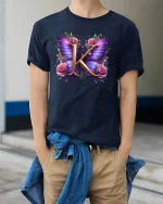 Elegant Butterfly Initial K Floral Graphic Tee with Pink Rose Art - model wearing navy tee with hands in pockets