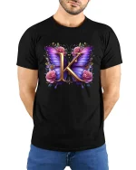 Elegant Butterfly Initial K Floral Graphic Tee with Pink Rose Art - model wearing black tee with hands behind back