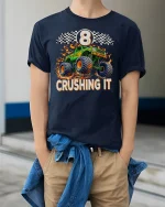Monster Truck 8 Crushing It Racing Power T-Shirt - model wearing navy tee with hands in pockets