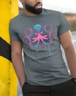 Neon Octopus Drip Art Deep Sea Vibes Graphic T-Shirt - model wearing grey tee, leaning on column