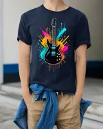 Vibrant Electric Guitar Splash Art Tee for Music Lovers - model wearing navy tee with hands in pockets