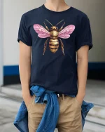 Pink Winged Golden Bee Art Tee for Nature Lovers - model wearing navy tee with hands in pockets