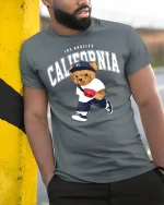 California Bear Street Style Tee for Trendy LA Fashion Lovers - model wearing grey tee, leaning on column