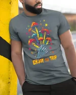 Psychedelic Mushroom Skeleton Hand Tee for Trippy Style Lovers - model wearing grey tee, leaning on column