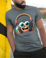 Cute Smiley Headphone Graphic Tee with Big Eyes and Fun Music Vibes - model wearing grey tee, leaning on column