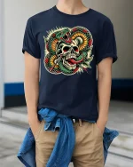 Venom Skull Strike Art Tee for Bold Style Lovers - model wearing navy tee with hands in pockets