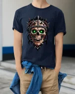 Inferno Skull Green Eyes Spiked Warrior Graphic Tee - model in navy tee with hands in pockets