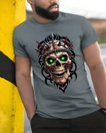 Inferno Skull Green Eyes Spiked Warrior Graphic Tee - model in grey tee leaning on column