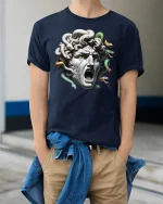Medusa Stone Head Mythical Monster Graphic T-Shirt - model wearing navy tee with hands in pockets