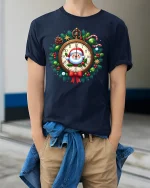 Santa Clock Christmas Wreath Graphic T Shirt Festive Holiday Tee - model wearing navy tee with hands in pockets