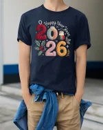 Happy New Year 2026 Knitted Style Graphic T Shirt Cozy Festive Tee - model wearing navy tee with hands in pockets