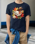 Autumn Piano Coffee Art Graphic T Shirt Cozy Music Lover Tee - model wearing navy tee with hands in pockets