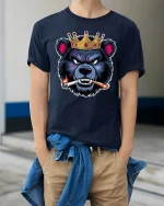 Crowned Savage Bear Smoking Cigar Fierce Attitude Graphic Tee Shirt - model wearing navy tee with hands in pockets