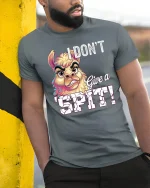 I Dont Give a Spit Funny Llama Attitude Graphic Tee Shirt - model wearing grey tee, leaning on column