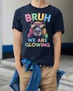 Bruh We Are Glowing Neon Bear Funny Retro Style Graphic Tee - model wearing navy tee with hands in pockets