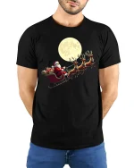 Santa Sleigh Moonlight Ride Classic Christmas Graphic T-Shirt - model wearing black tee with hands behind back