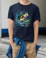 Explosive Bass Splash Fishing Art Tshirt Nature Energy Style - model wearing navy tee with hands in pockets