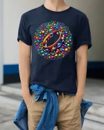 Colorful Music Tambourine Art Tee With Rhythm And Joyful Vibes - model wearing navy tee with hands in pockets
