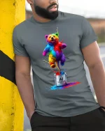 Colorful AI Creator Bear Tee With Explosive Creative Energy - model wearing grey tee, leaning on column
