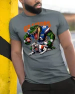 Fierce Gator Football Graphic T Shirt With Powerful Game Energy - model wearing grey tee, leaning on column